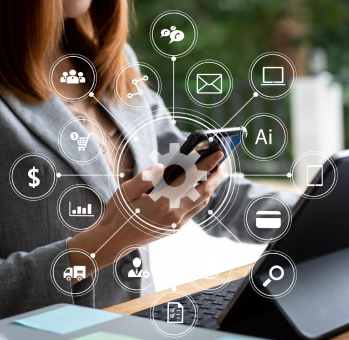 A businesswoman using a smartphone with digital icons for cybersecurity concepts floating around her, highlighting small business digital protection.